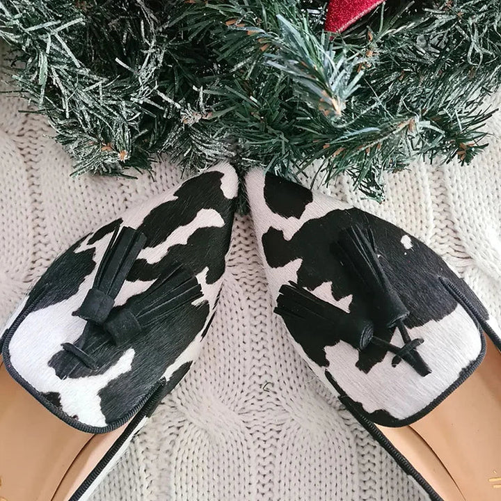 Delilah | Cow Print Loafers With Tassel