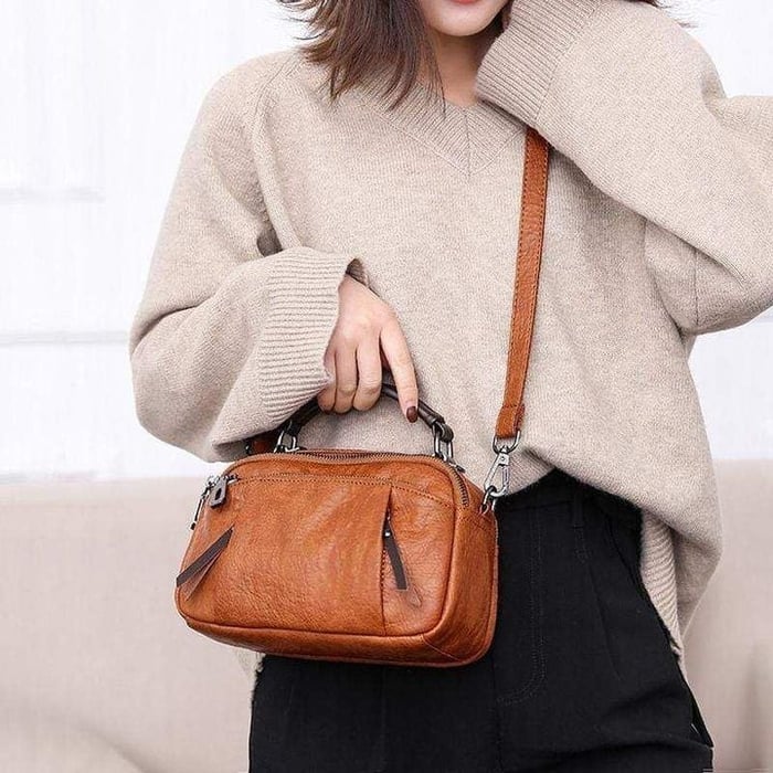 Finbjørg | Small and versatile bag in golden cognac shade